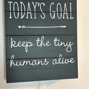 Wall decor sign: “Todays Goal: Keep The Tiny Humans Alive”